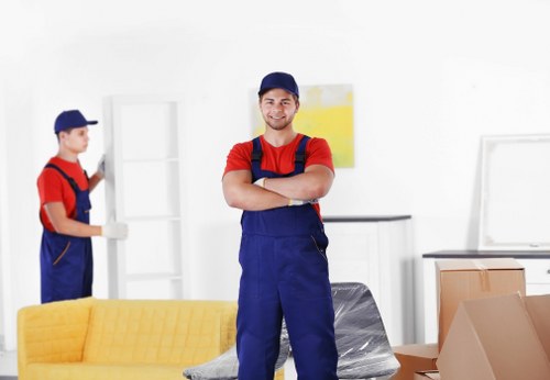 Removal team planning a move in Bermondsey with boxes and furniture