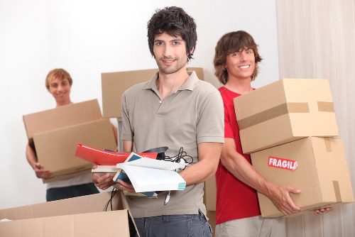 Removals team loading boxes for a Bermondsey property move