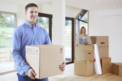 Packed office boxes and furniture ready for transport
