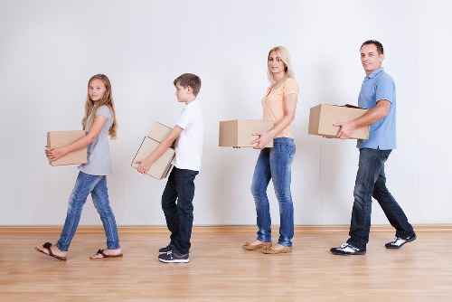 Packed boxes and furniture ready for a local relocation